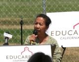 FIRST 5 Santa Clara County Commissioner Cora Tomalinas addresses the attendess of the Educare at Silicon Valley groundbreaking.